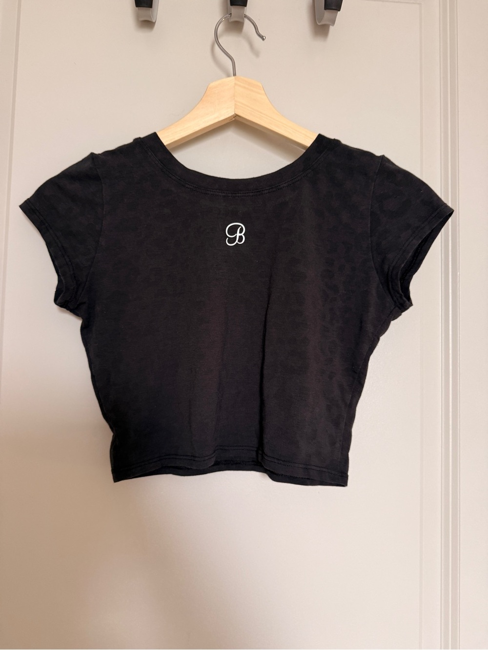 Bombshell Sportswear Black Leopard-Textured Cropped Tee - Picture 2 of 6